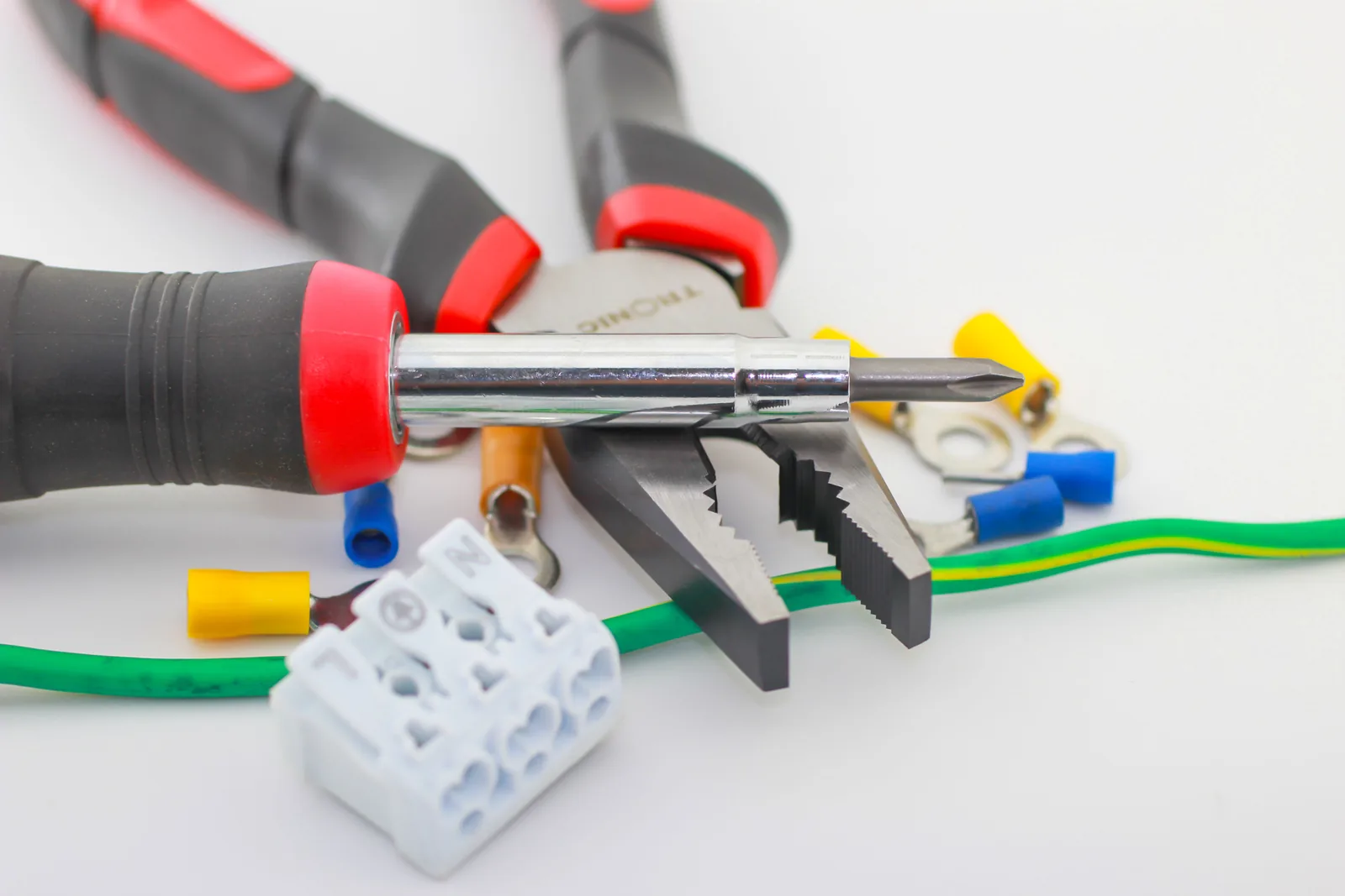 Pliers, a screwdriver, ferrules and a connector block, for electrician in Hamilton