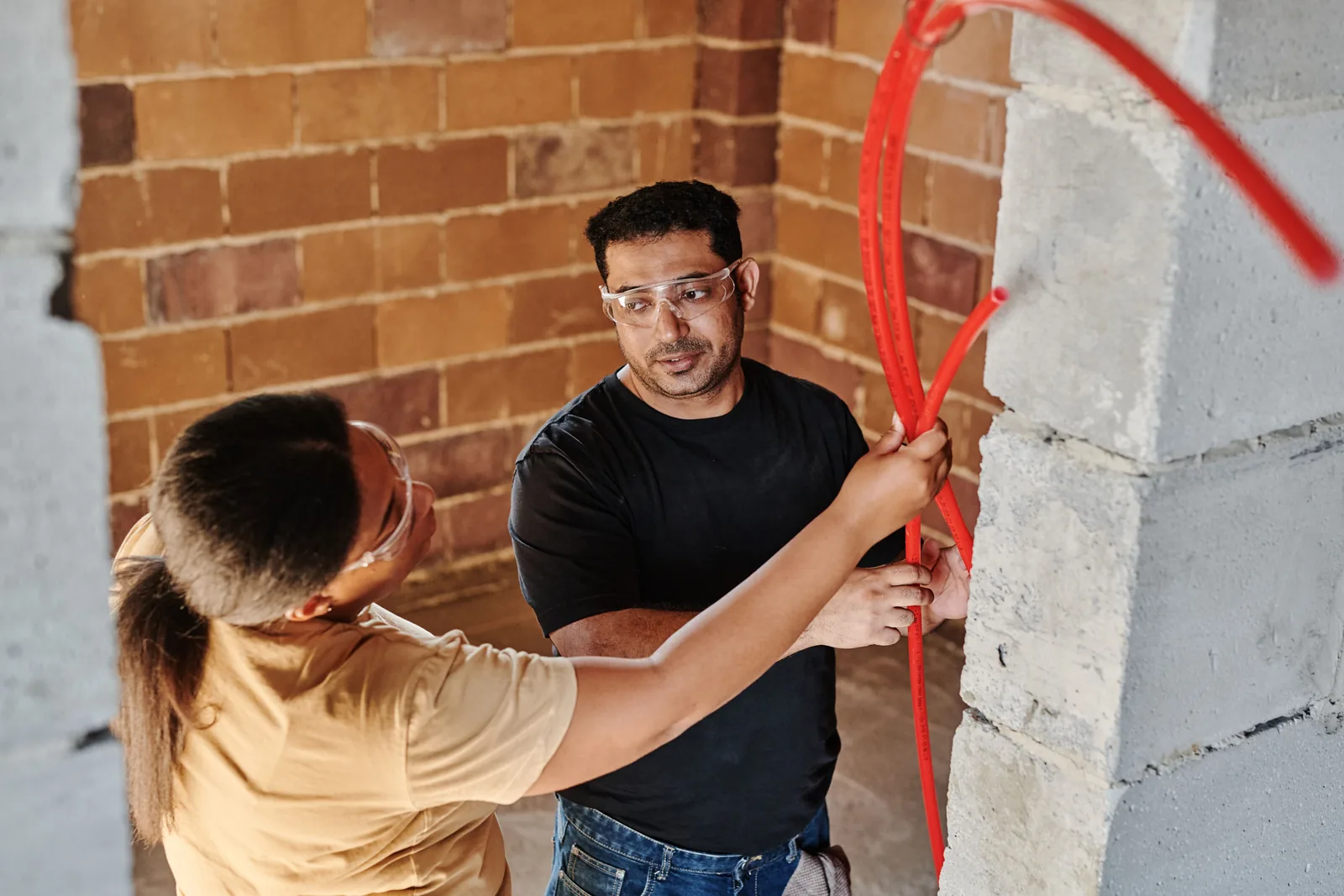 Running conduit across a block wall, for electrician in Ancaster
