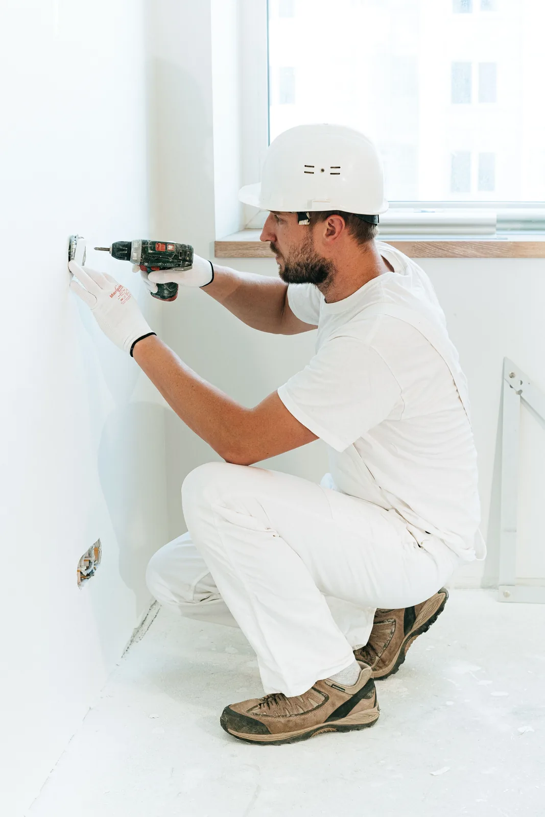 Fixing a socket into a finished wall, for electrician in Hamilton
